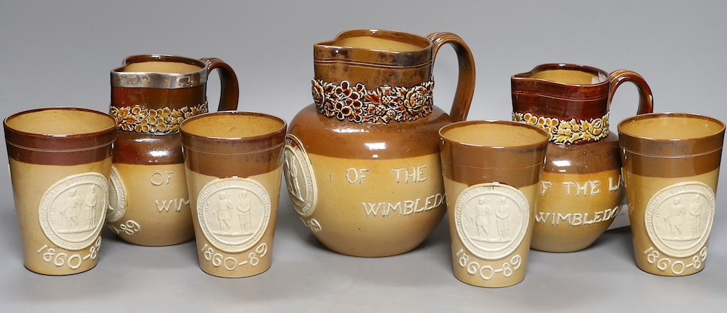 National Rifle Association, salt glazed stoneware, three jugs and four tumblers, 1860-1889, tallest 17cm